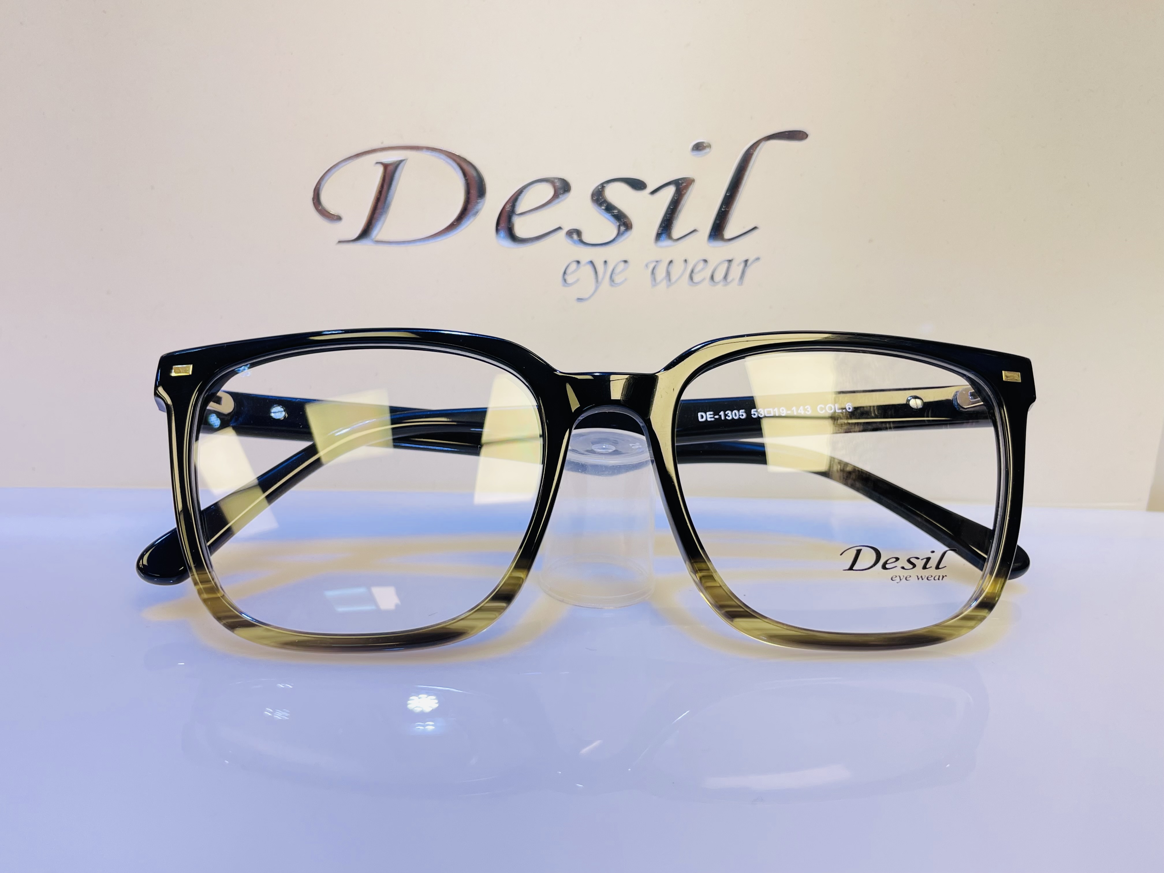 عینک عینک طبی یونیسکسDesil یونیسکس Desil مدل مشکی طرح دار